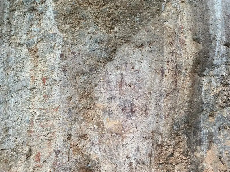Cangyuan cliff paintings: 3,000-year-old hunters in morning light