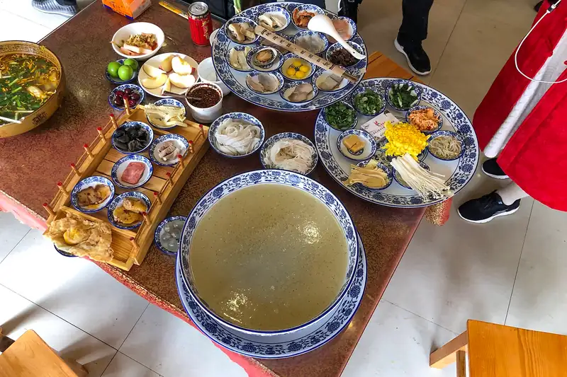 Crossing-the-bridge noodles in Mengzi, where the story is set