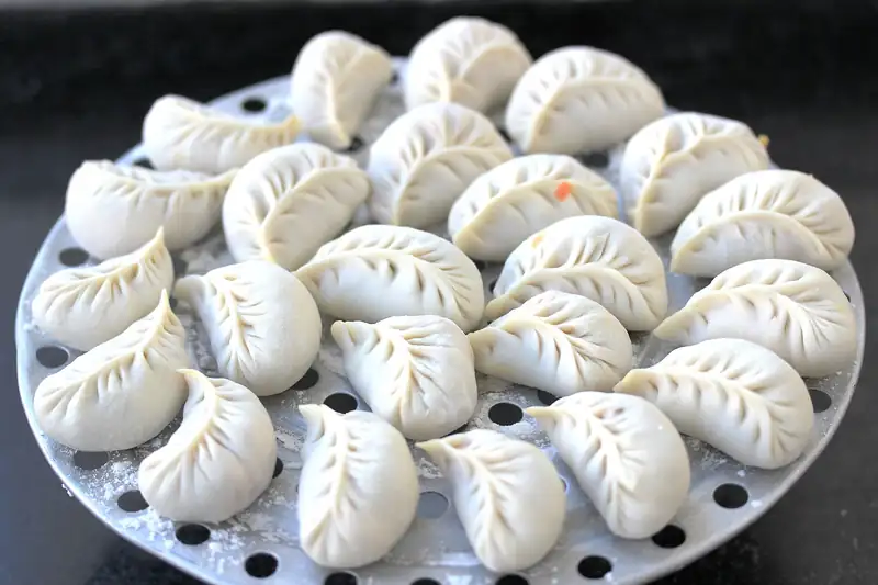Dumpling making at a family table