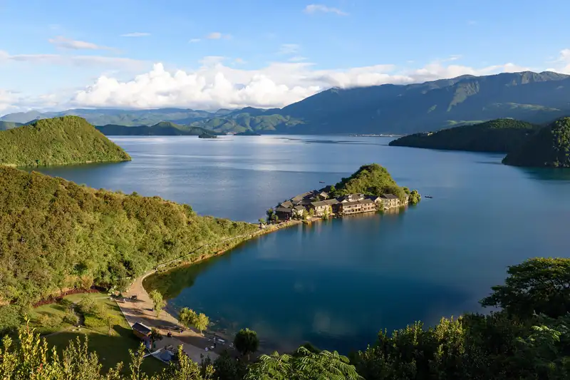 Lugu Lake and its shoreline seen from the hillside viewpoint above Lige