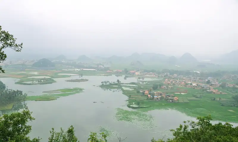 Climb Qinglong Mountain for the view over Puzhehei